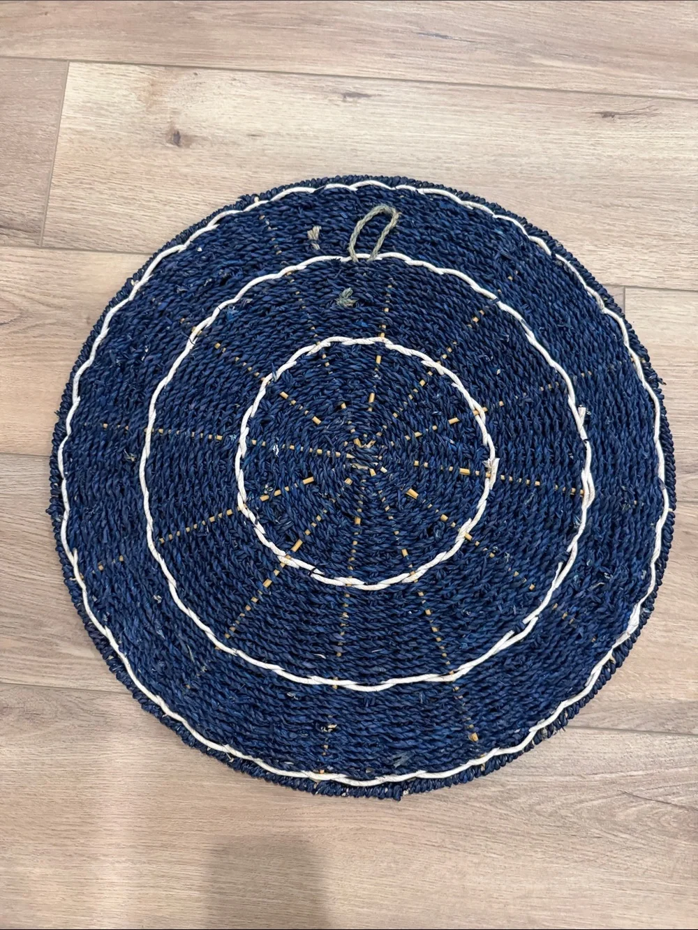 Handwoven Navy and White Round Seagrass Accent Wall Hanging.